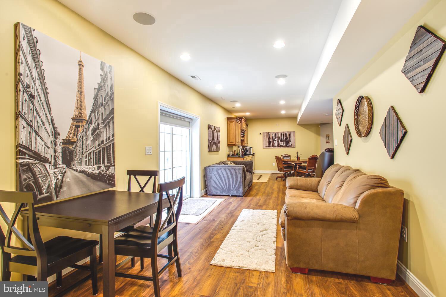 3403 Logstone Drive Triangle, VA 22172 - Photo 52 of 66 a living room with furniture and wooden floor