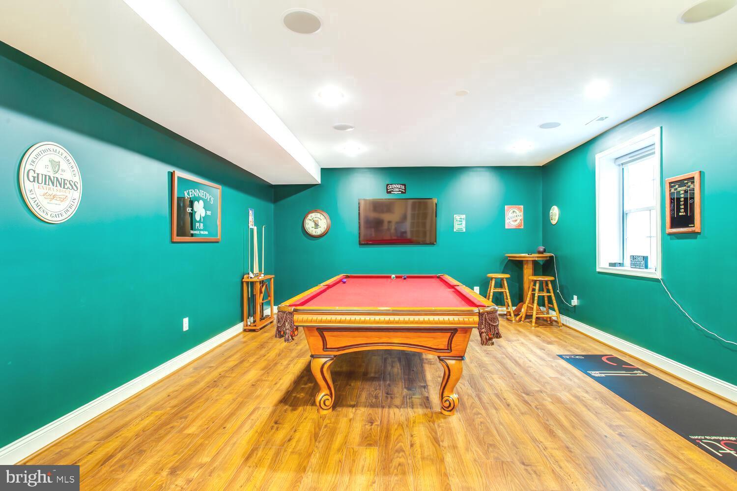 3403 Logstone Drive Triangle, VA 22172 - Photo 53 of 66 a room with pool table and paintings on the wall
