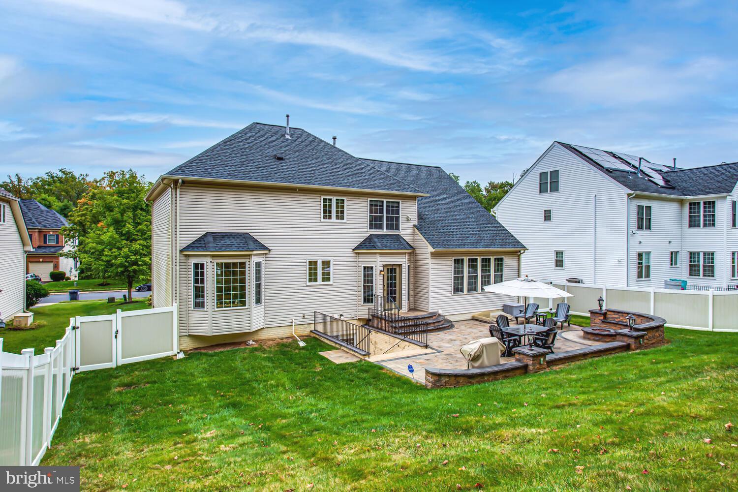 3403 Logstone Drive Triangle, VA 22172 - Photo 61 of 66 a front view of house with yard and green space