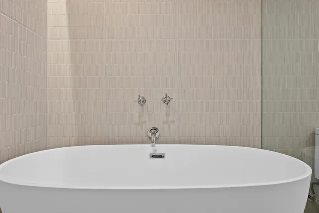 a bathroom with a bathtub