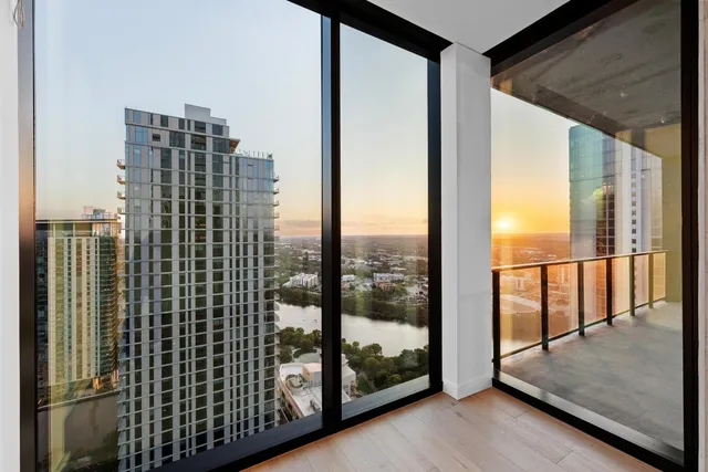 a view of a balcony with city view