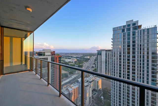 a view of a balcony with city view