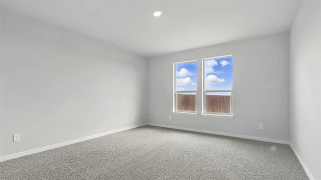 a view of kitchen with sink microwave and stove