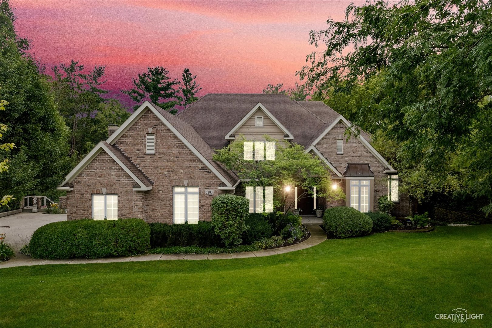 3293 Oak Knoll Road Carpentersville, IL 60110 - Photo 1 of 44 a front view of a house with a yard