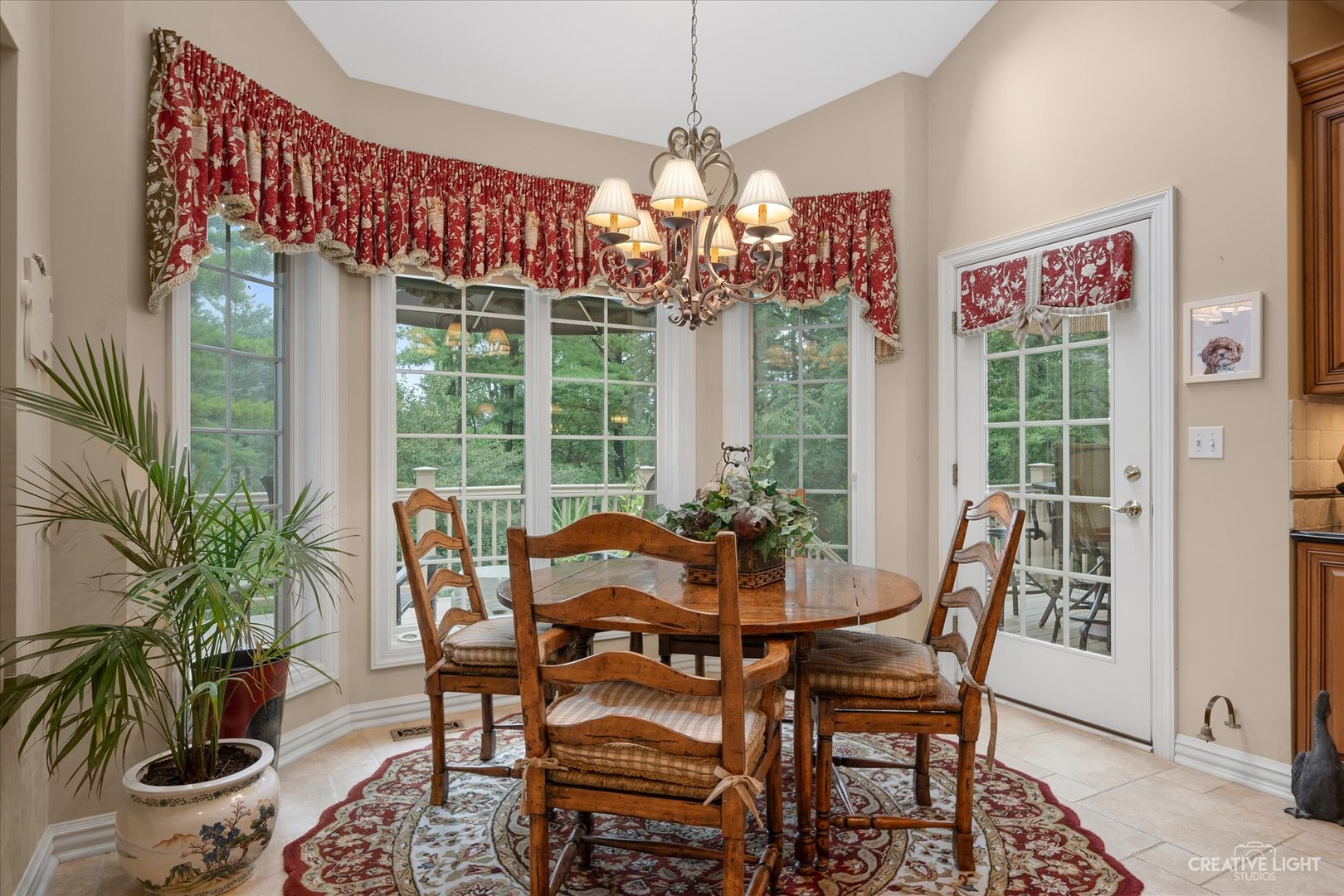 3293 Oak Knoll Road Carpentersville, IL 60110 - Photo 11 of 44 a view of a dining room with furniture window and outside view