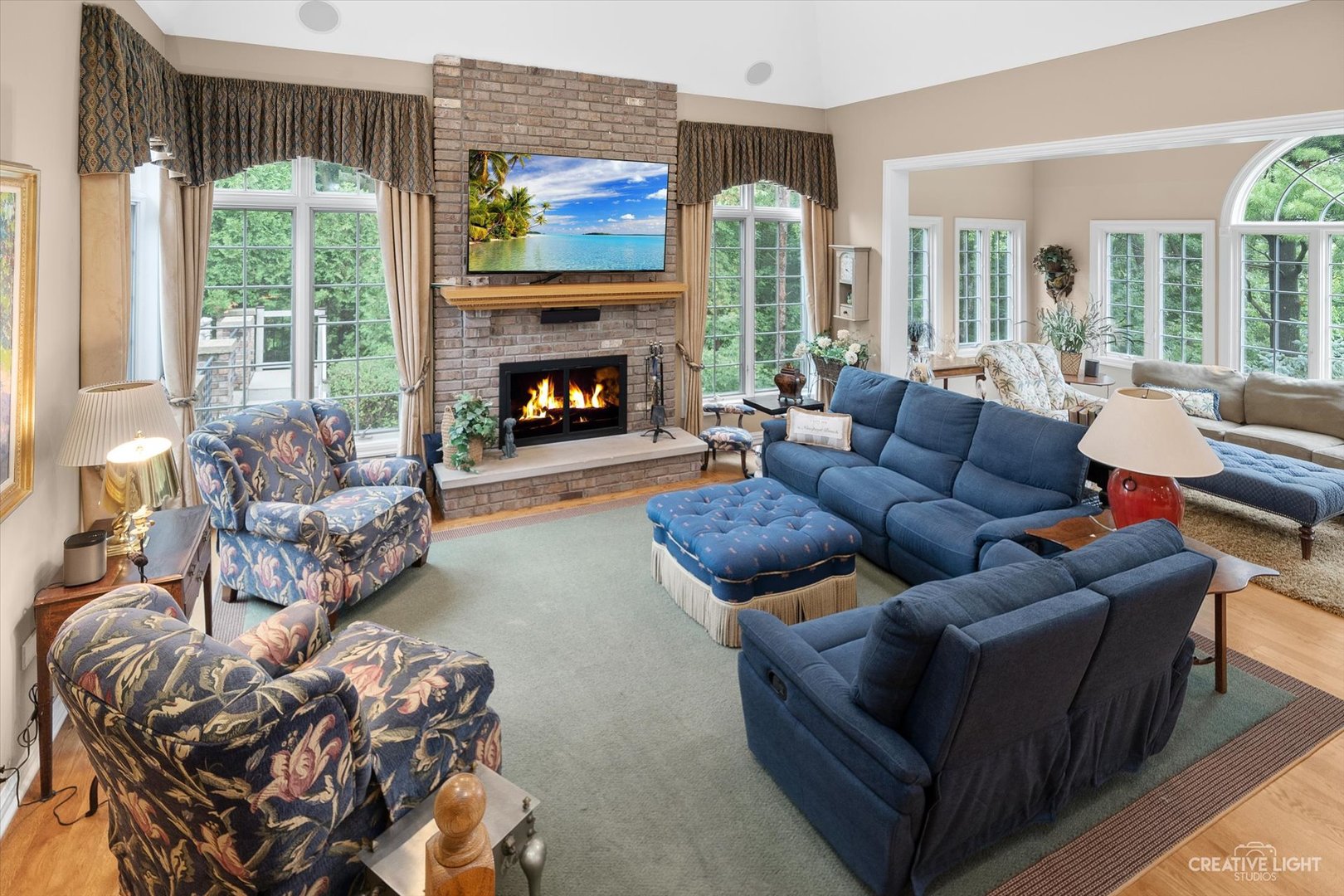 3293 Oak Knoll Road Carpentersville, IL 60110 - Photo 12 of 44 a living room with furniture and a fireplace