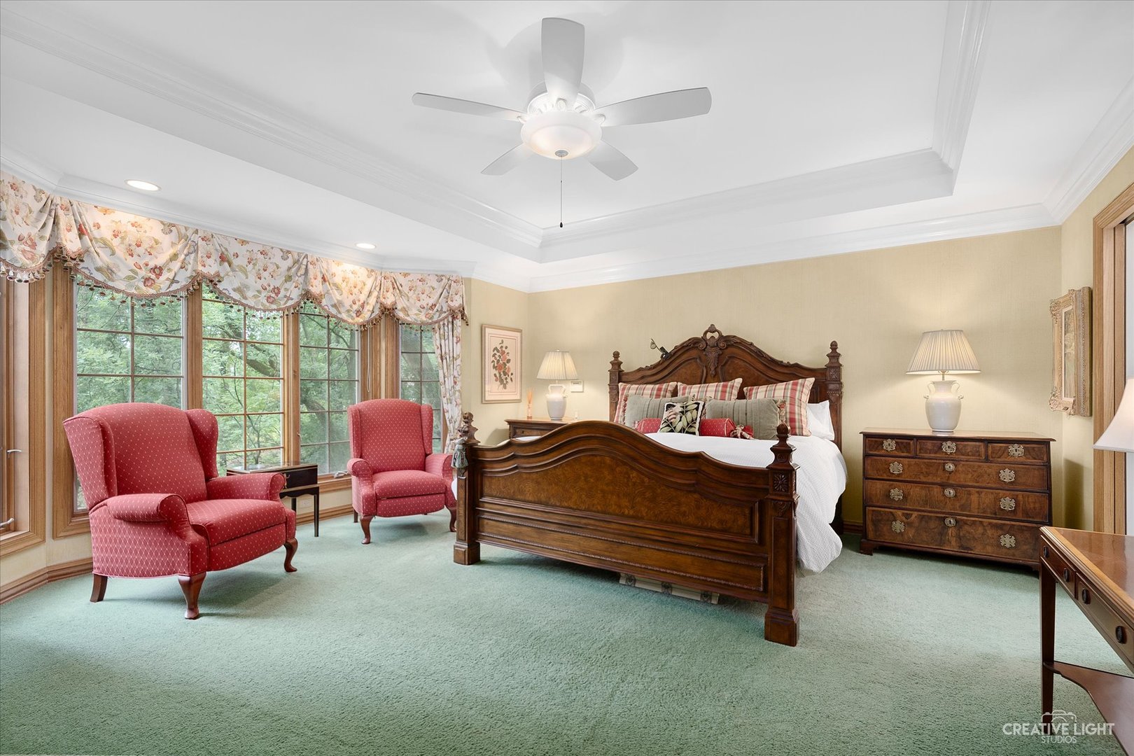 3293 Oak Knoll Road Carpentersville, IL 60110 - Photo 18 of 44 a bedroom with a bed and a lounge chair