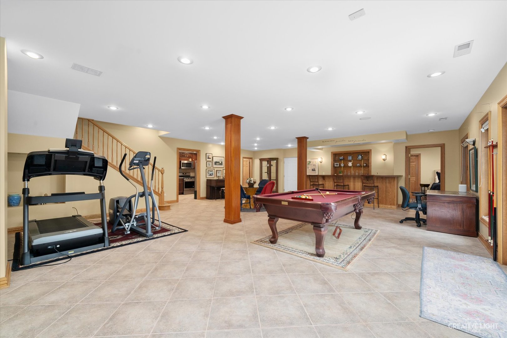 3293 Oak Knoll Road Carpentersville, IL 60110 - Photo 29 of 44 a living room with furniture and a table