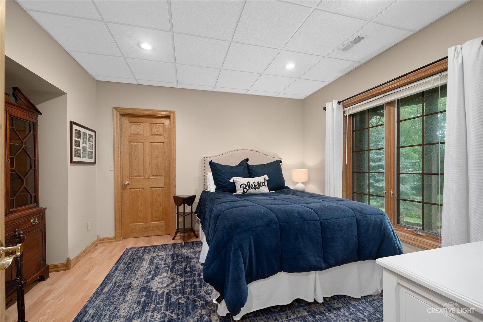 3293 Oak Knoll Road Carpentersville, IL 60110 - Photo 31 of 44 a bedroom with a bed and a television