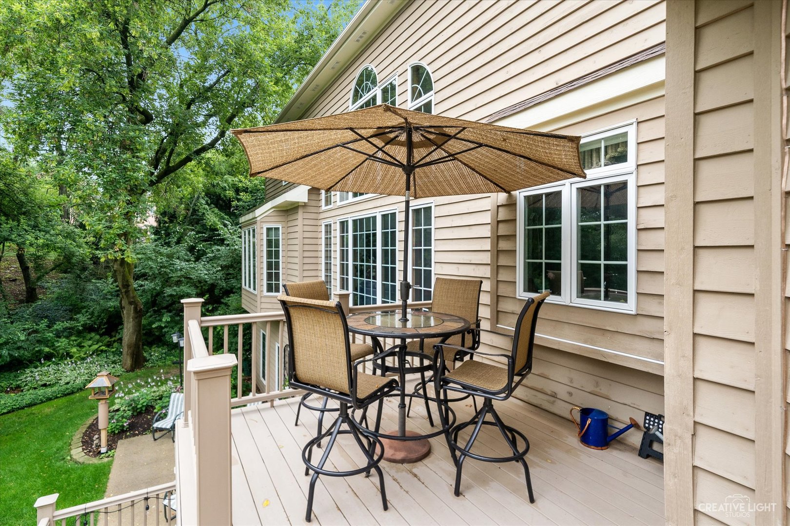 3293 Oak Knoll Road Carpentersville, IL 60110 - Photo 37 of 44 a view of a patio with table and chairs and potted plants