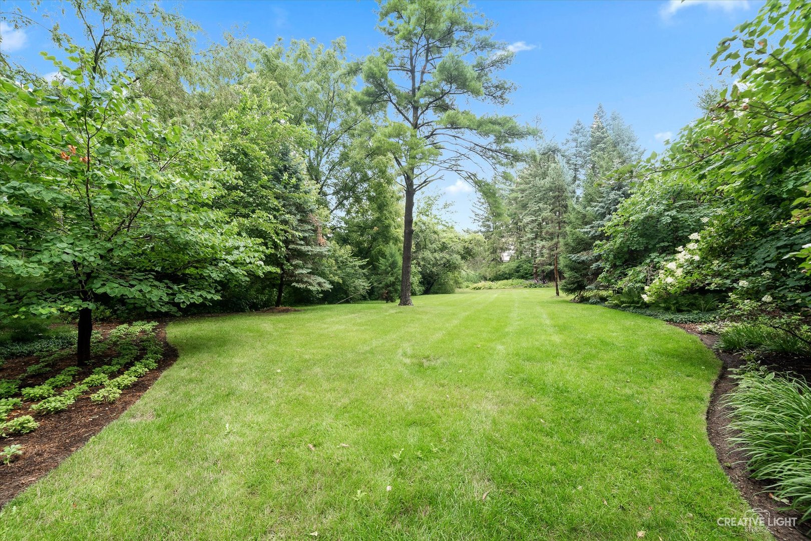 3293 Oak Knoll Road Carpentersville, IL 60110 - Photo 39 of 44 a view of a field with a tree