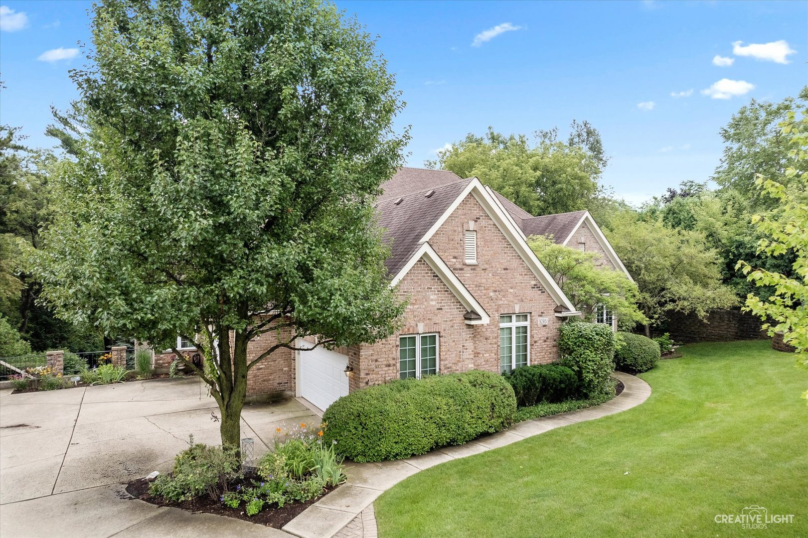 3293 Oak Knoll Road Carpentersville, IL 60110 - Photo 43 of 44 a front view of a house with garden