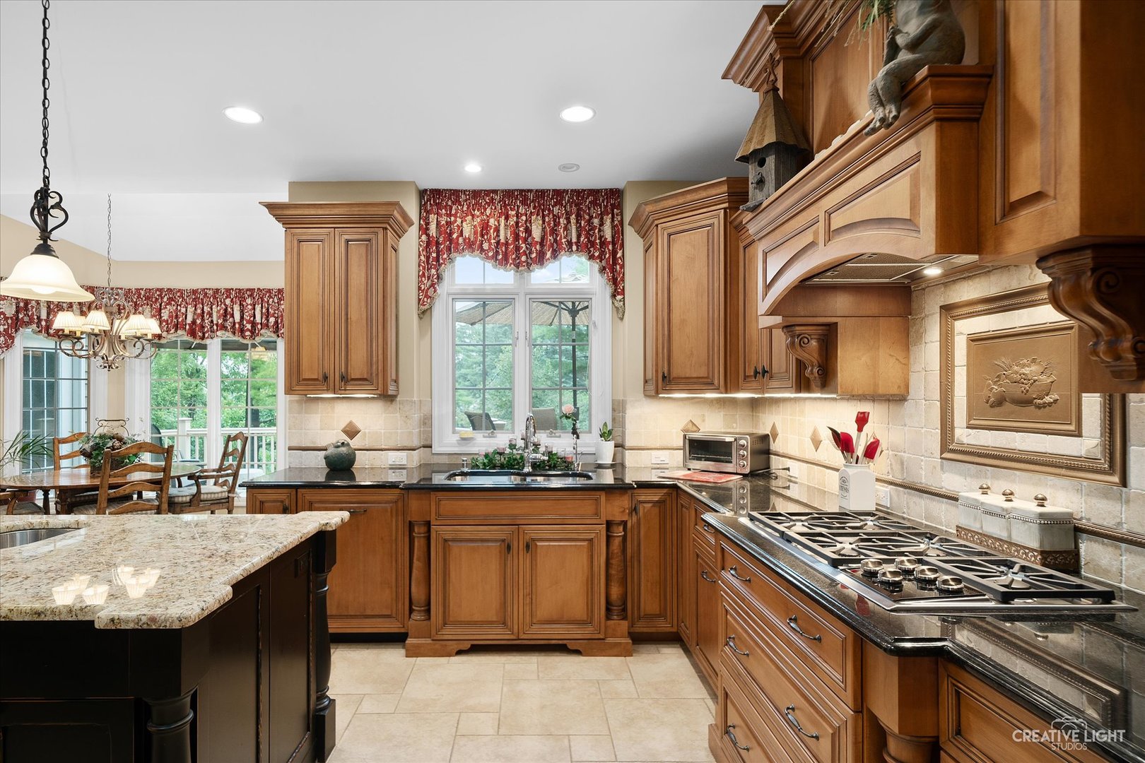 3293 Oak Knoll Road Carpentersville, IL 60110 - Photo 8 of 44 a kitchen with stainless steel appliances granite countertop a sink stove and cabinets