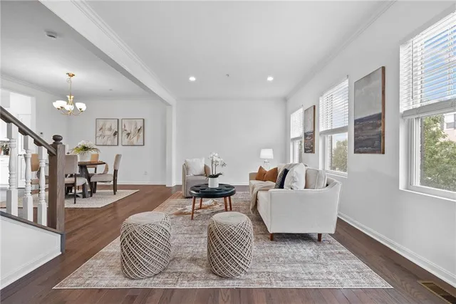 a living room with furniture and a table