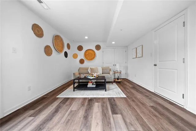 a view of workspace with wooden floor