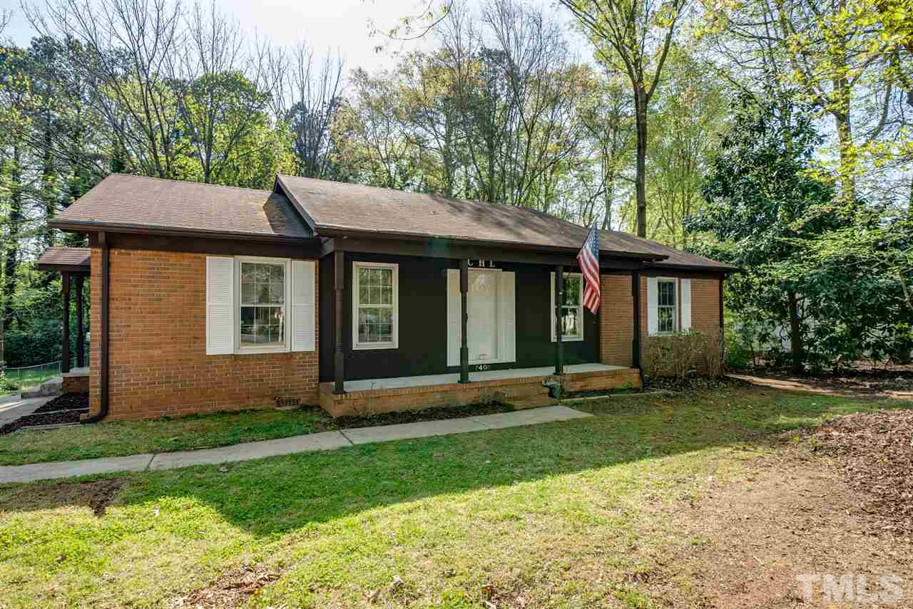 7408 Mine Shaft Road Raleigh, NC 27615 - Photo 1 of 20 front view of a house with a yard
