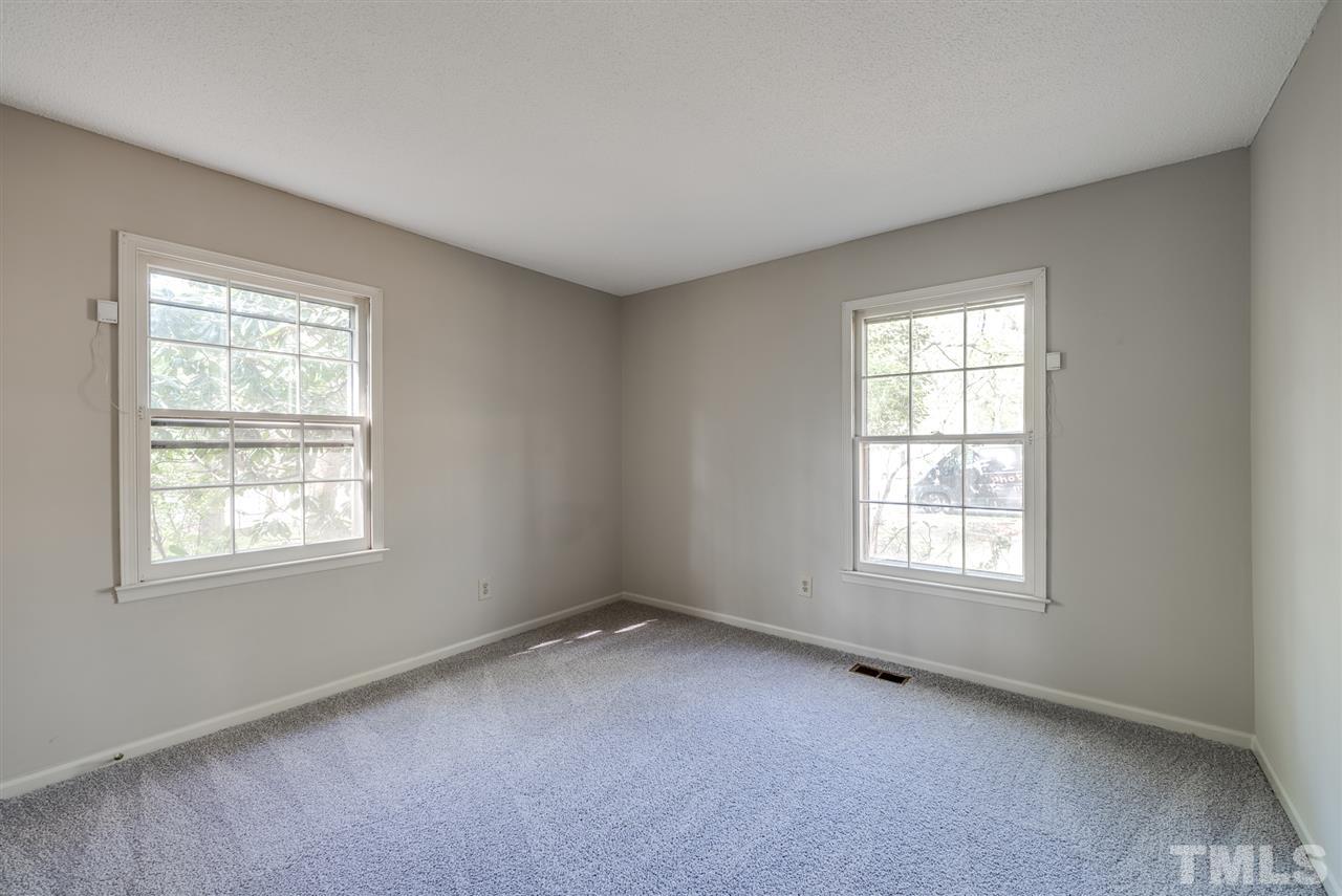 7408 Mine Shaft Road Raleigh, NC 27615 - Photo 13 of 20 an empty room with a window