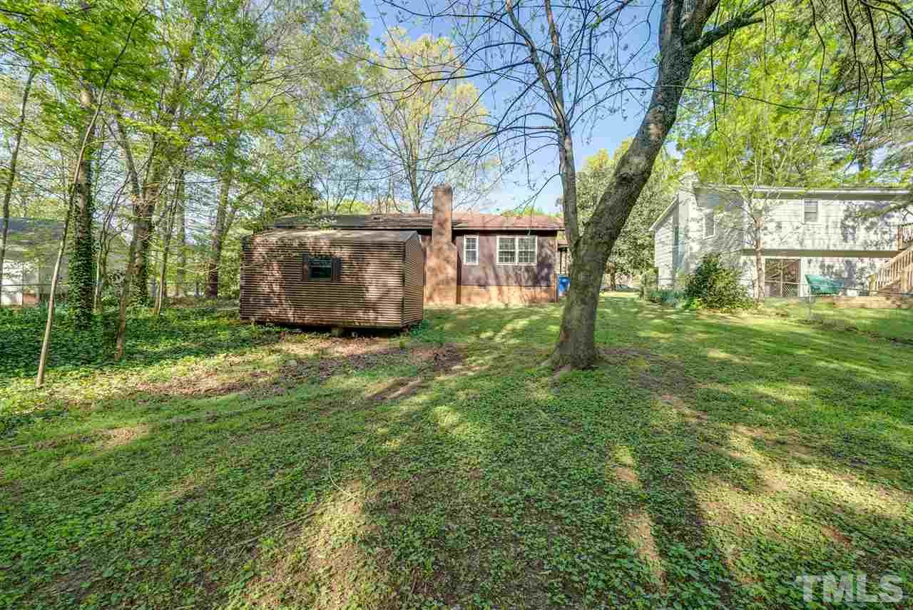 7408 Mine Shaft Road Raleigh, NC 27615 - Photo 20 of 20 a view of backyard with tree