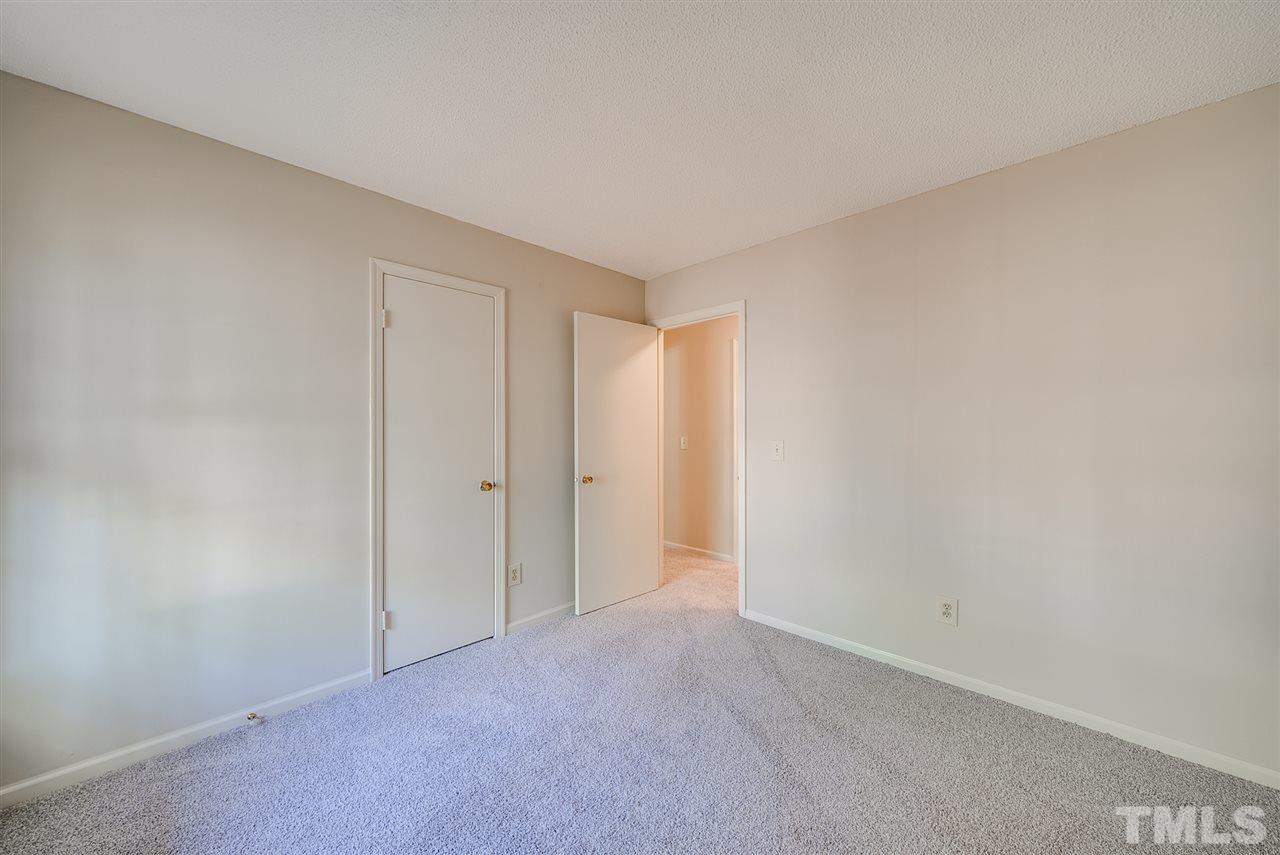 7408 Mine Shaft Road Raleigh, NC 27615 - Photo 9 of 20 a view of an empty room and entryway