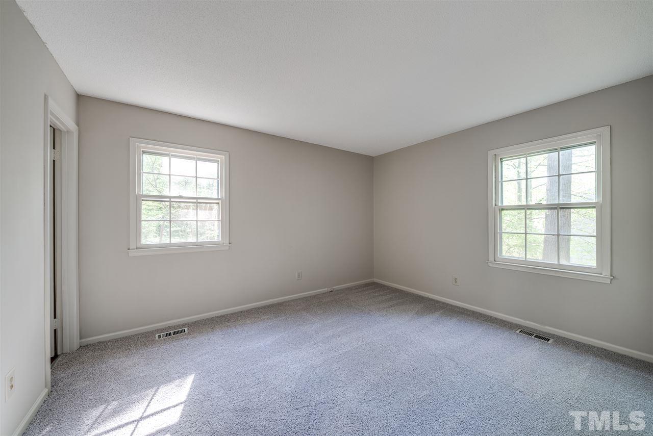 7408 Mine Shaft Road Raleigh, NC 27615 - Photo 10 of 20 an empty room with a window