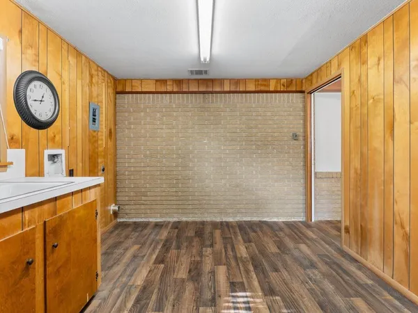 a bathroom with a sink a mirror and a shower