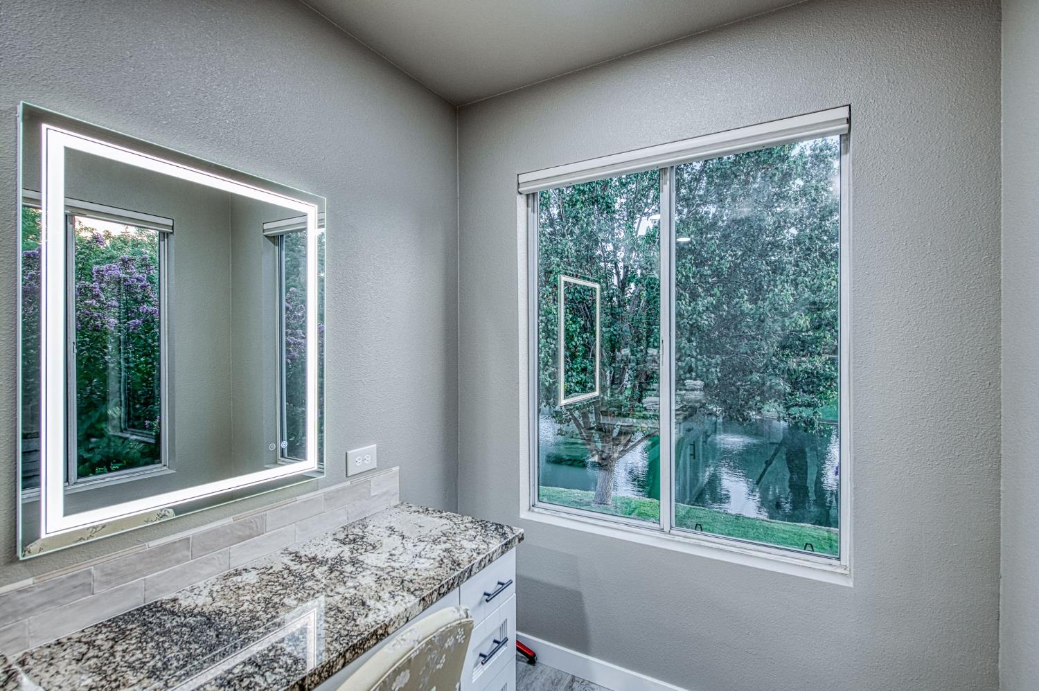 3077 West Pembrook Loop Fresno, CA 93711 - Photo 42 of 56 a view of a room that has a bed and a window