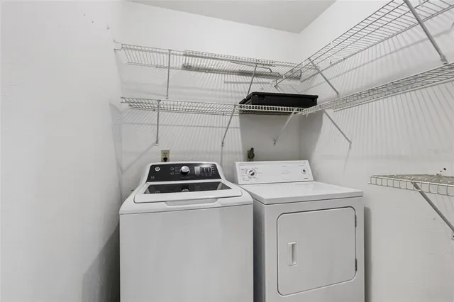 a utility room with dryer and washer