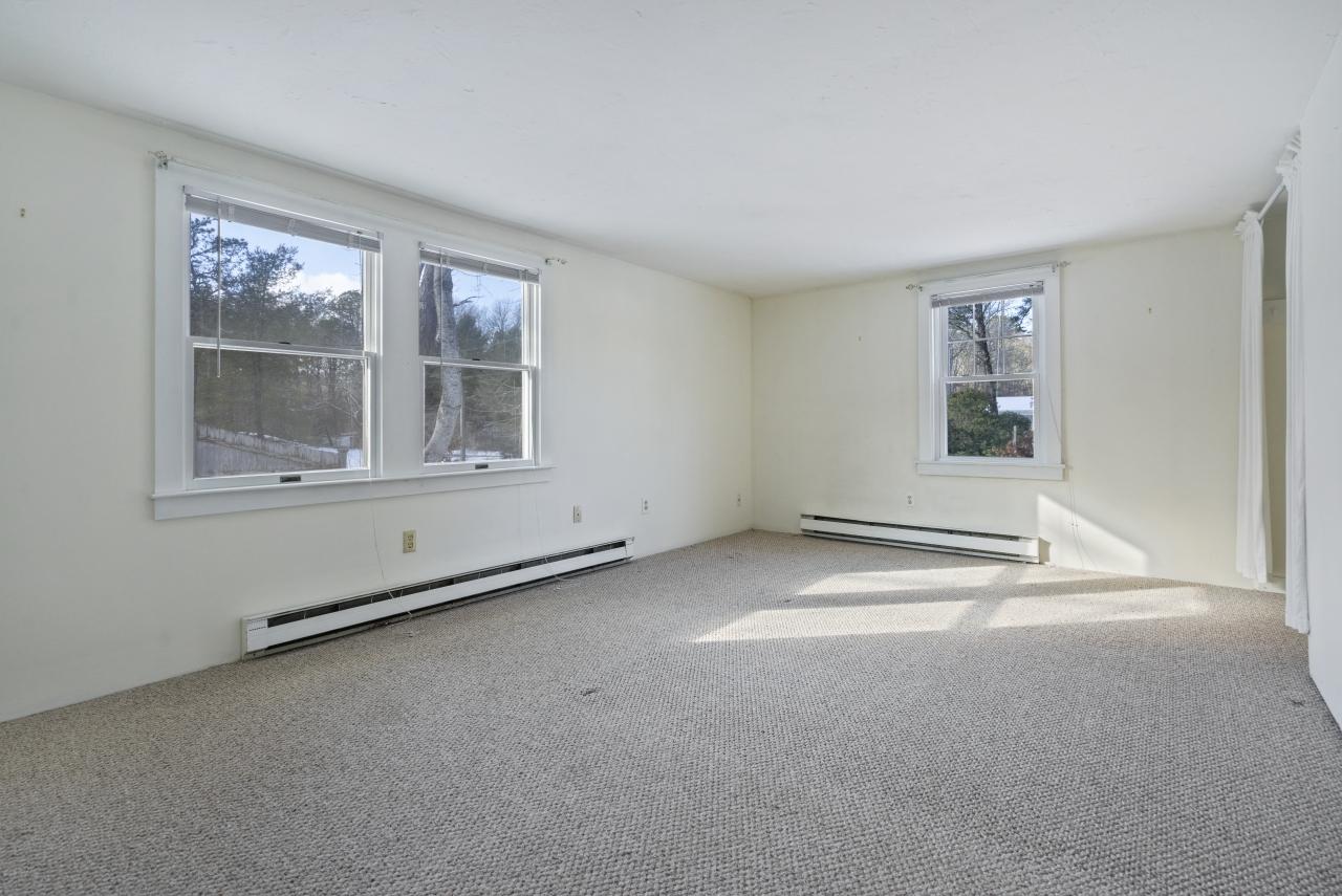 59 Fire Station Road Osterville, MA 02655 - Photo 1 of 31 an empty room with a window