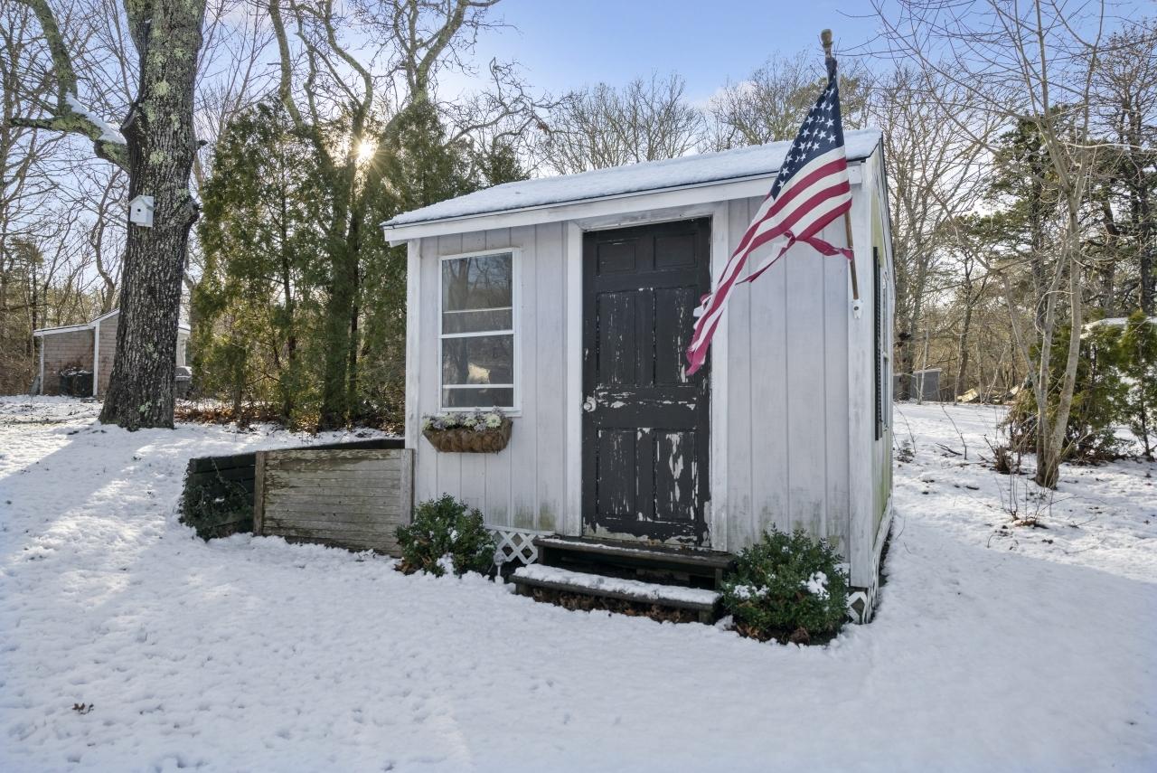 59 Fire Station Road Osterville, MA 02655 - Photo 27 of 31 a view of a house with backyard and trees