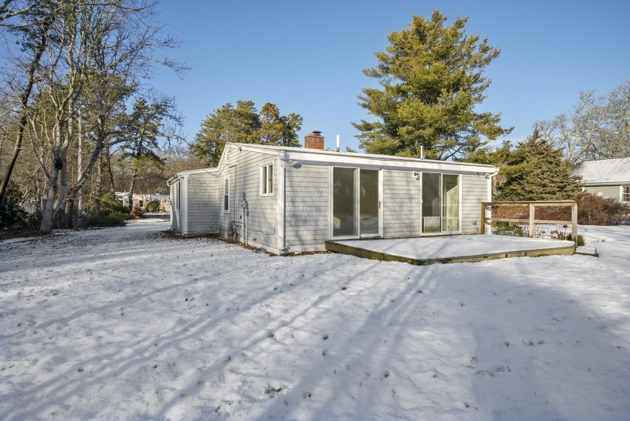 59 Fire Station Road Osterville, MA 02655 - Photo 28 of 31 a view of a house with a yard and garage