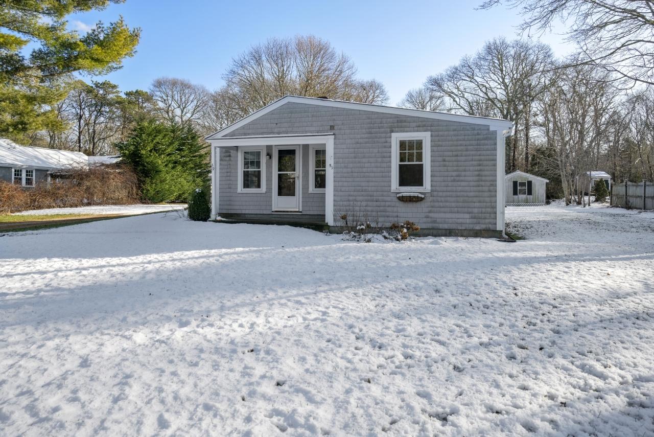 59 Fire Station Road Osterville, MA 02655 - Photo 29 of 31 a front view of a house with a yard