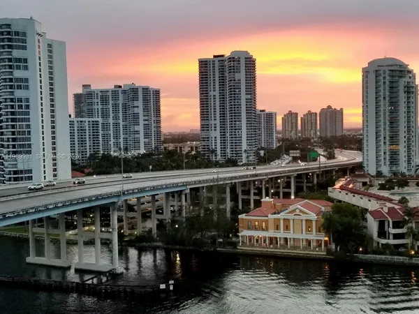 a view of a city with tall buildings