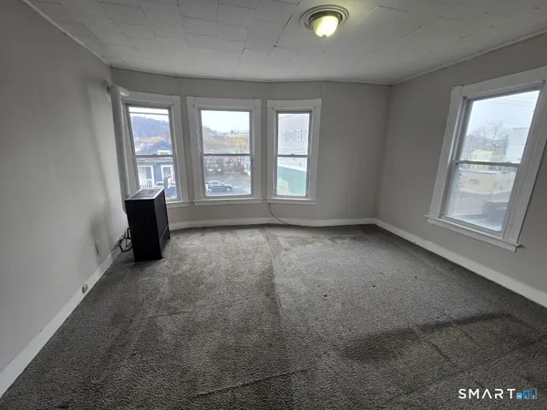 an empty room with windows