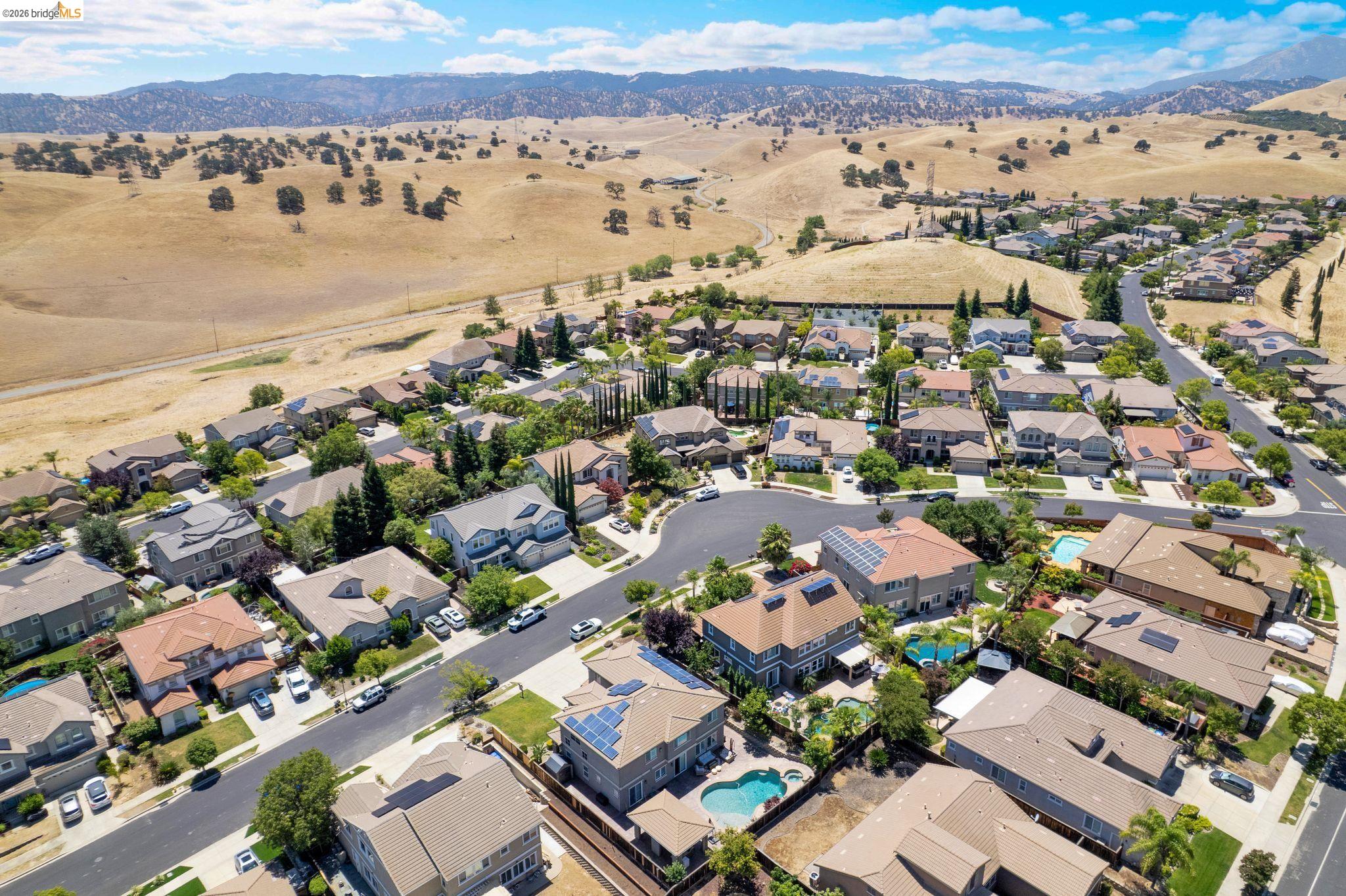 2513 Winged Foot Road Brentwood, CA 94513 - Photo 44 of 45 Residential community featuring a variety of architectural styles, mature trees, and a mountain backdrop