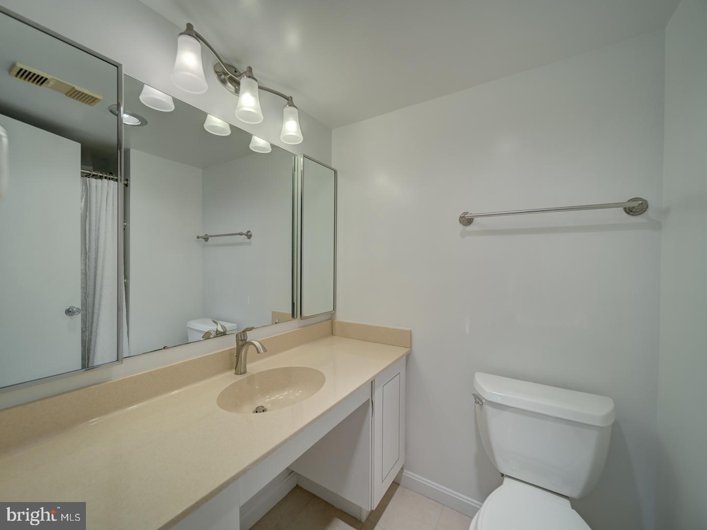 8360 Greensboro Drive, Unit 305 McLean, VA 22102 - Photo 12 of 46 Full bath with walk in shower