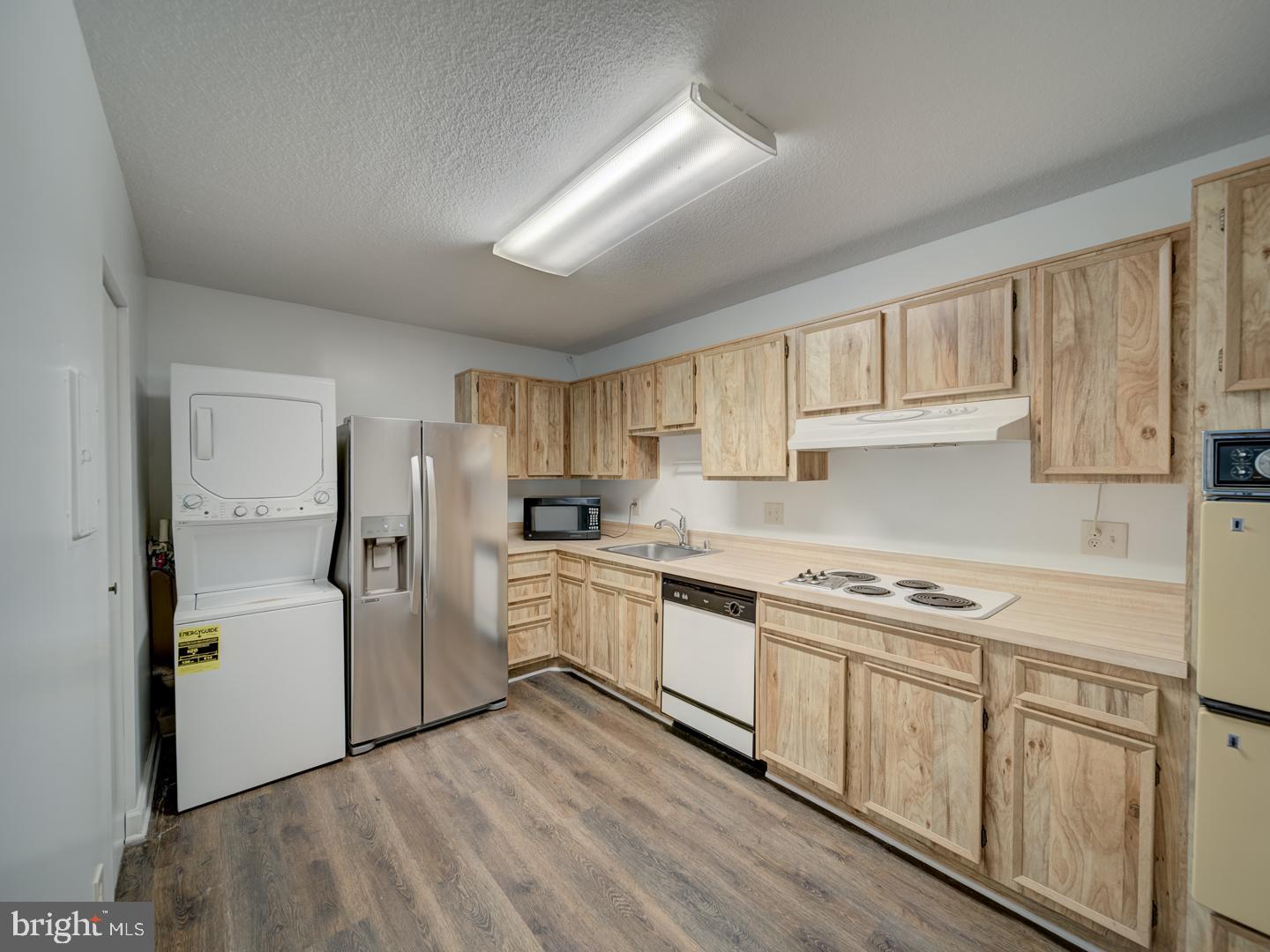 8360 Greensboro Drive, Unit 305 McLean, VA 22102 - Photo 13 of 46 KITCHEN and pantry to left of new w/d