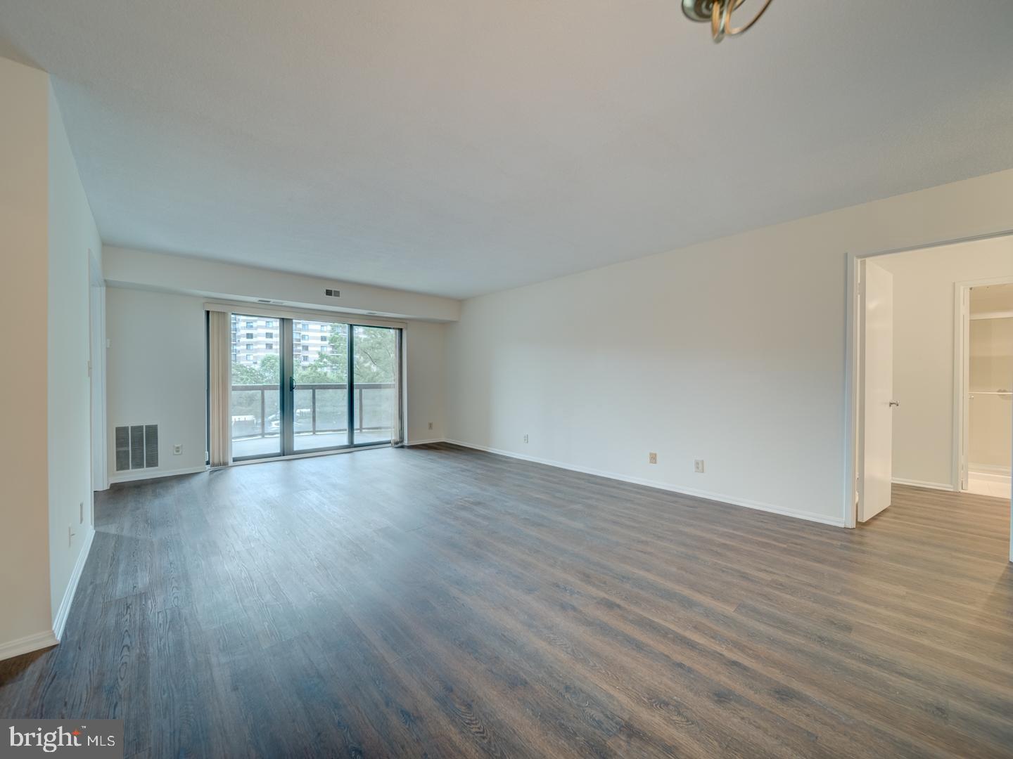 8360 Greensboro Drive, Unit 305 McLean, VA 22102 - Photo 5 of 46 Living Room adjacent to the 13x9 Balcony
