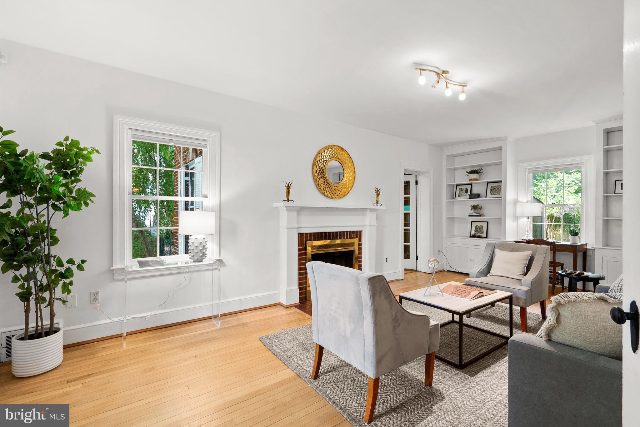 10325 Parkman Road Silver Spring, MD 20903 - Photo 7 of 47 Living room with wood burning fireplace