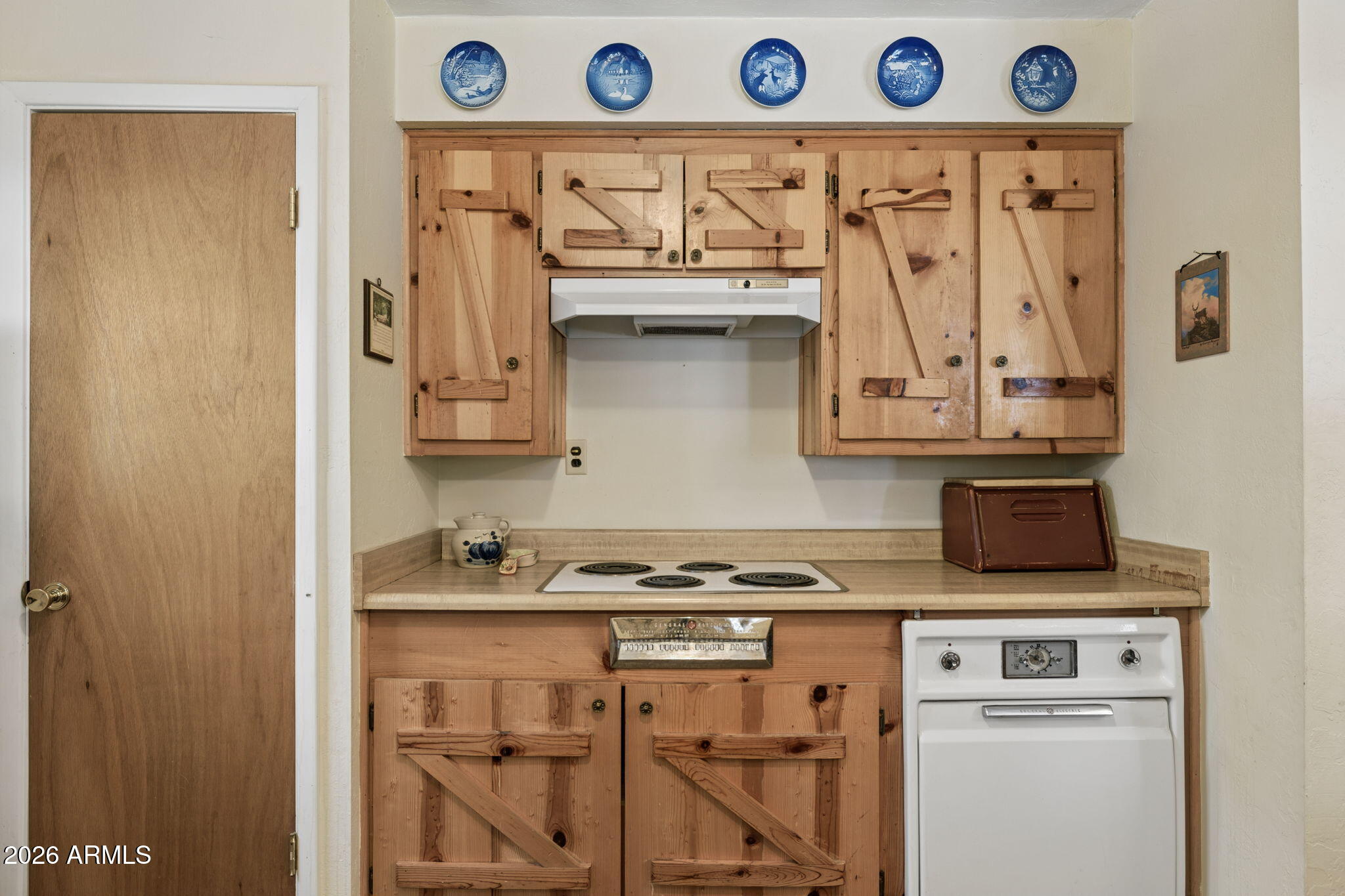 8726 Emmas View Pine, AZ 85544 - Photo 11 of 29 a kitchen with a stove a sink and cabinets