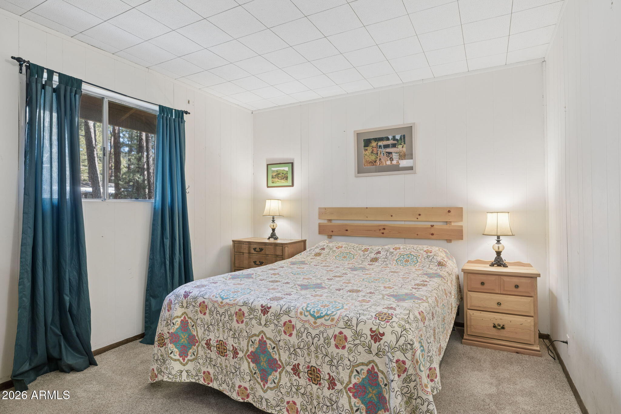 8726 Emmas View Pine, AZ 85544 - Photo 14 of 29 a bedroom with a bed and a night stand