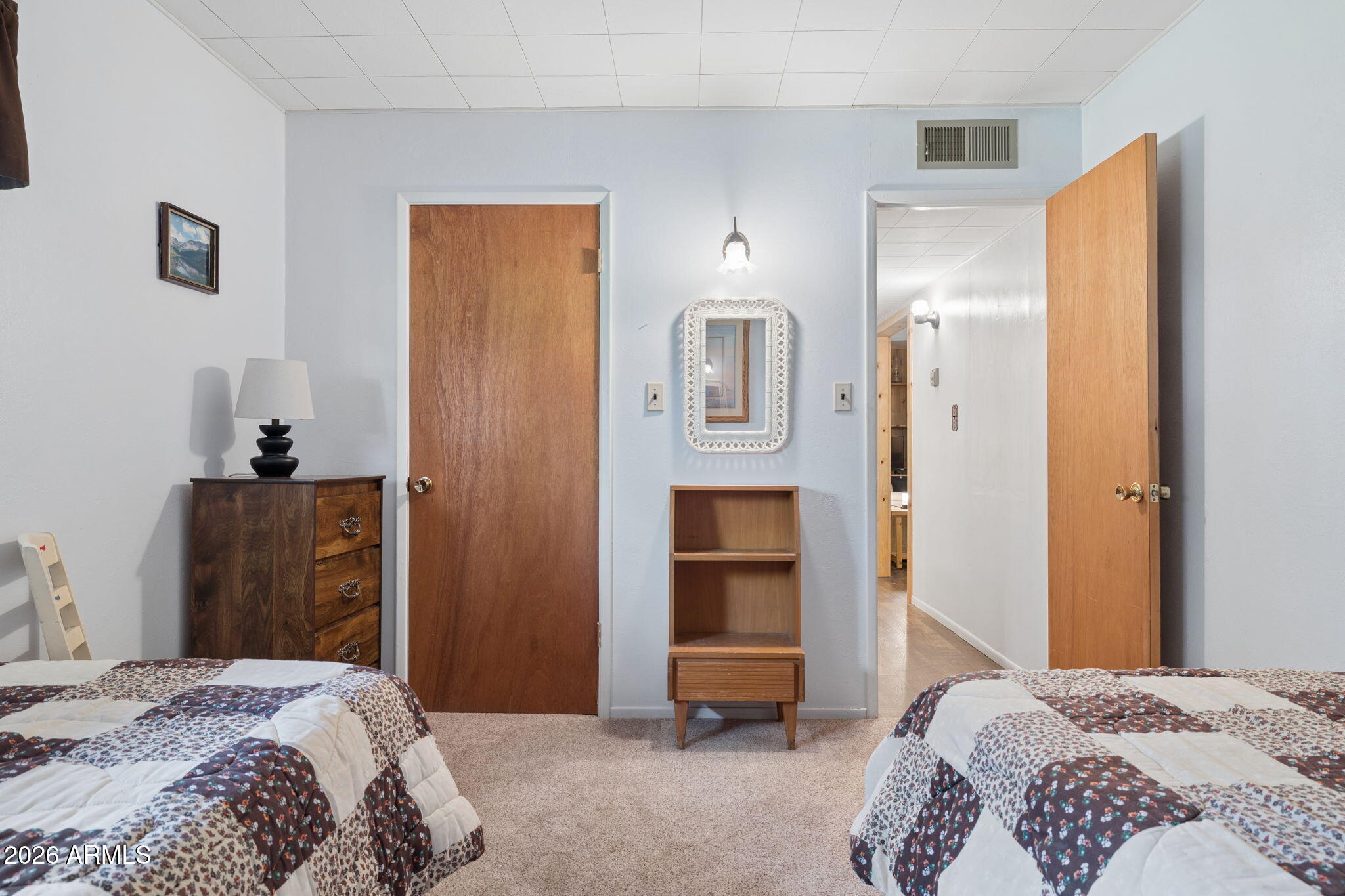 8726 Emmas View Pine, AZ 85544 - Photo 20 of 29 a bedroom with a bed and a dresser