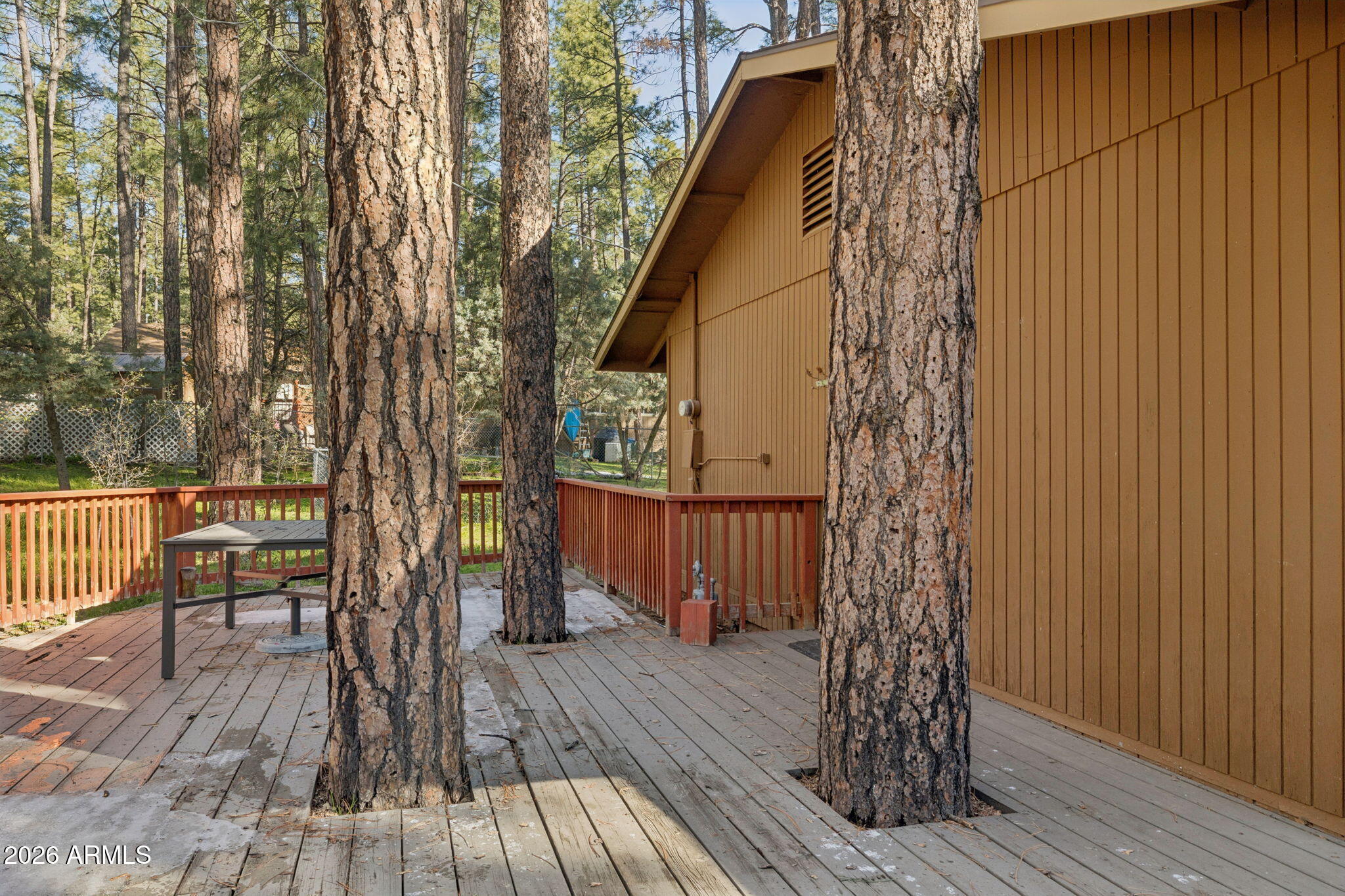 8726 Emmas View Pine, AZ 85544 - Photo 22 of 29 a view of balcony with wooden floor and bench