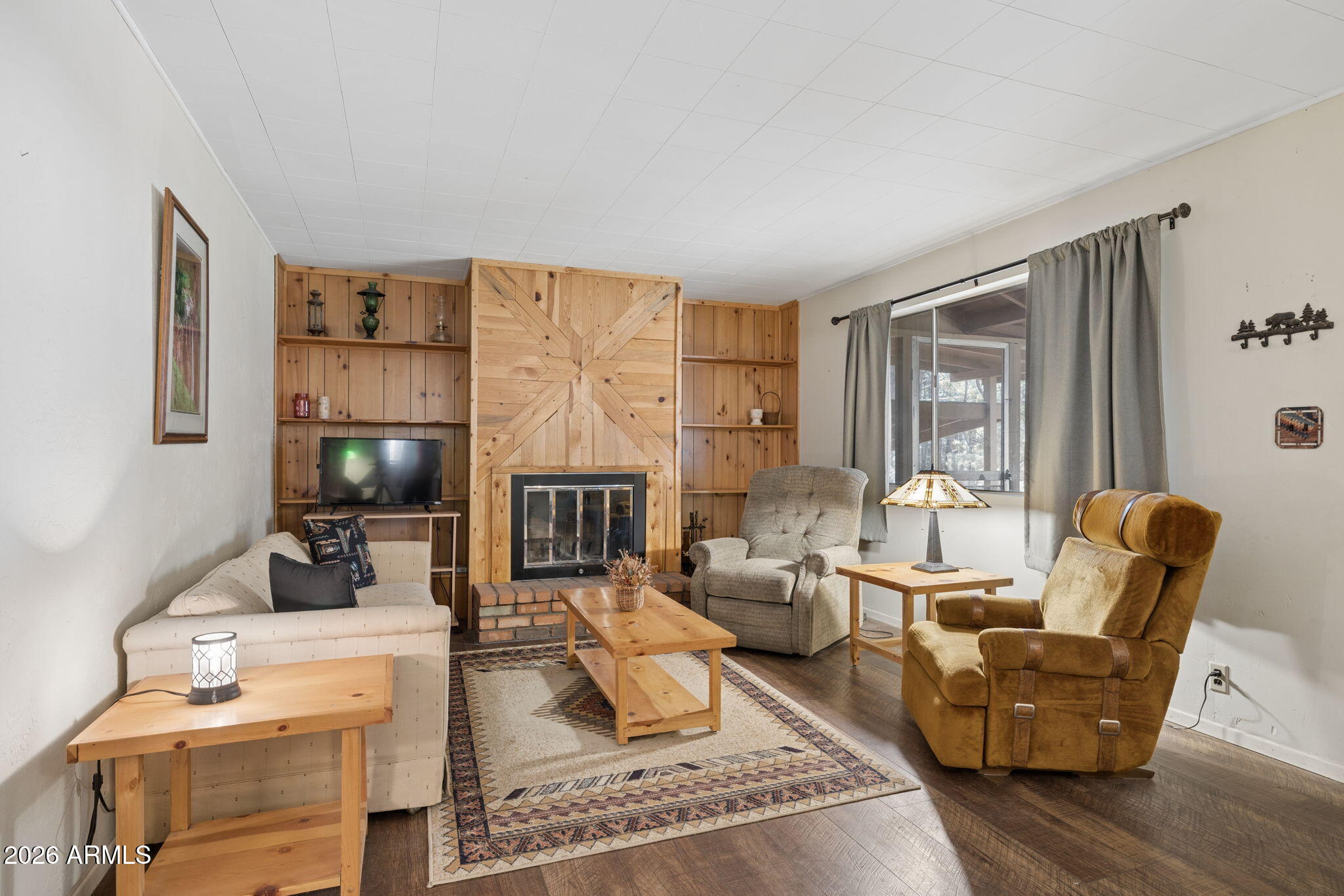 8726 Emmas View Pine, AZ 85544 - Photo 7 of 29 a living room with furniture fireplace and flat screen tv
