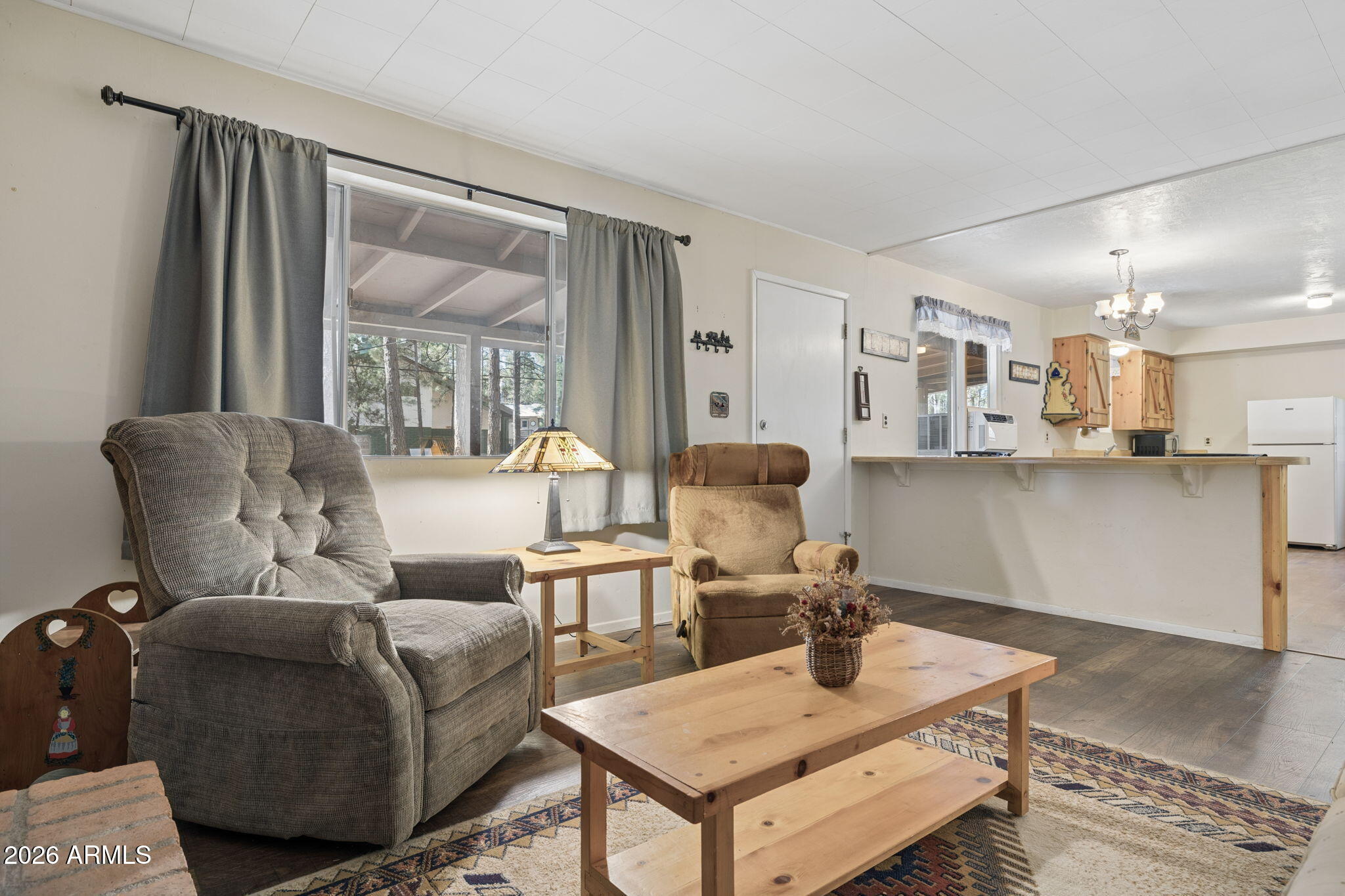 8726 Emmas View Pine, AZ 85544 - Photo 8 of 29 a living room with furniture and a table