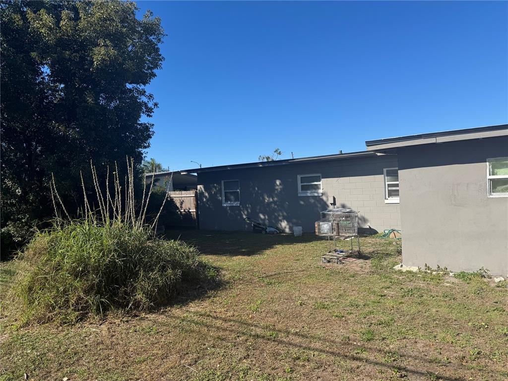 1620 36th Street Orlando, FL 32839 - Photo 6 of 7 a view of a back yard of the house