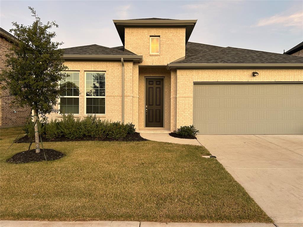 2905 Italia Terrace Princeton, TX 75407 - Photo 1 of 22 a front view of a house with a yard