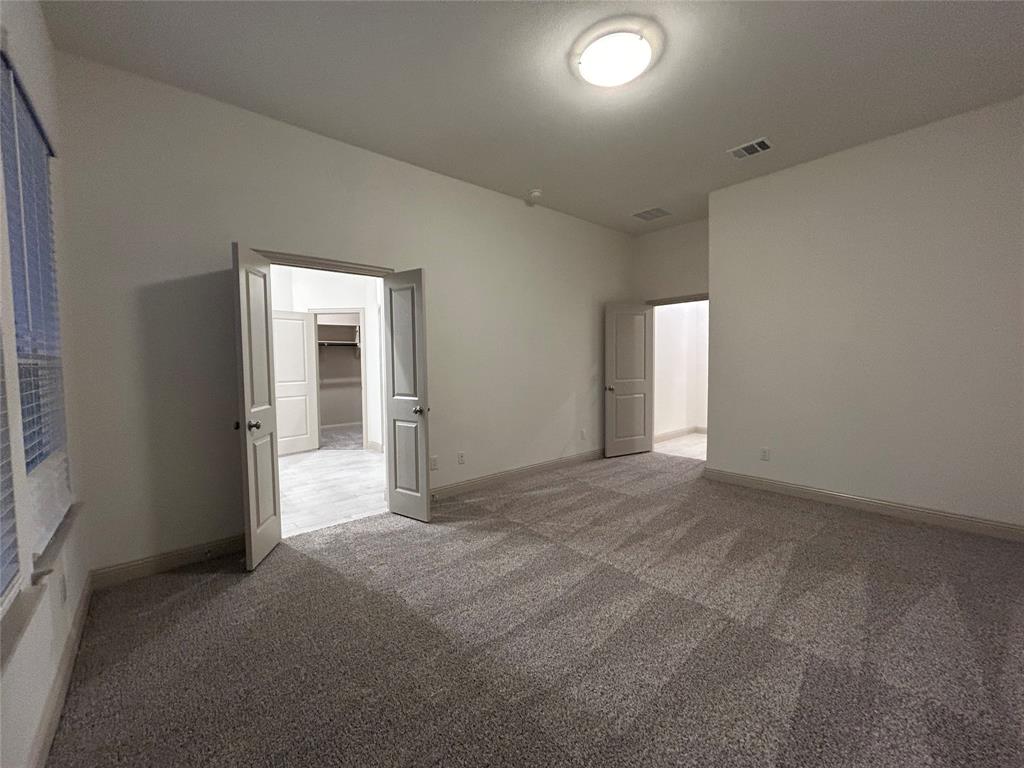 2905 Italia Terrace Princeton, TX 75407 - Photo 14 of 22 a view of an empty room with a window