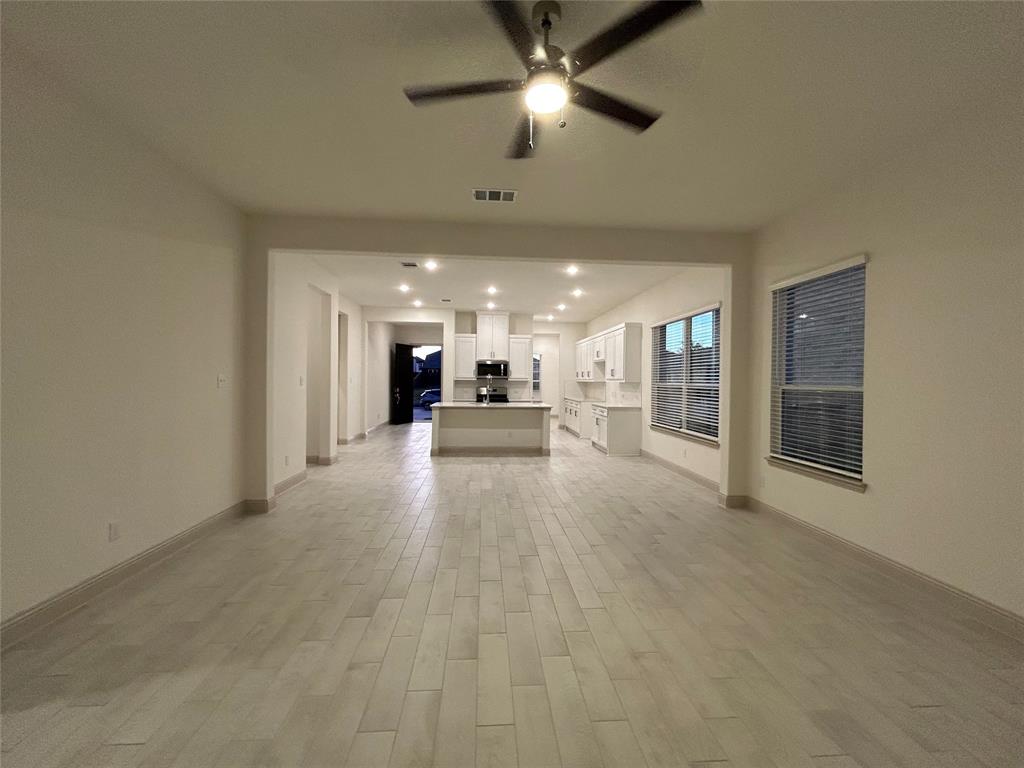 2905 Italia Terrace Princeton, TX 75407 - Photo 5 of 22 a view of an empty room and kitchen view