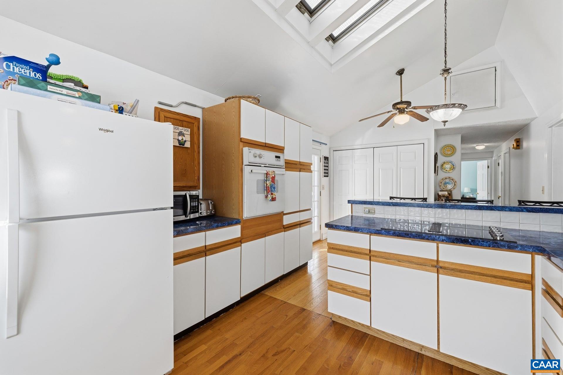 979 Cedar Grove Road Ruckersville, VA 22968 - Photo 17 of 33 a kitchen with stainless steel appliances a refrigerator and a stove