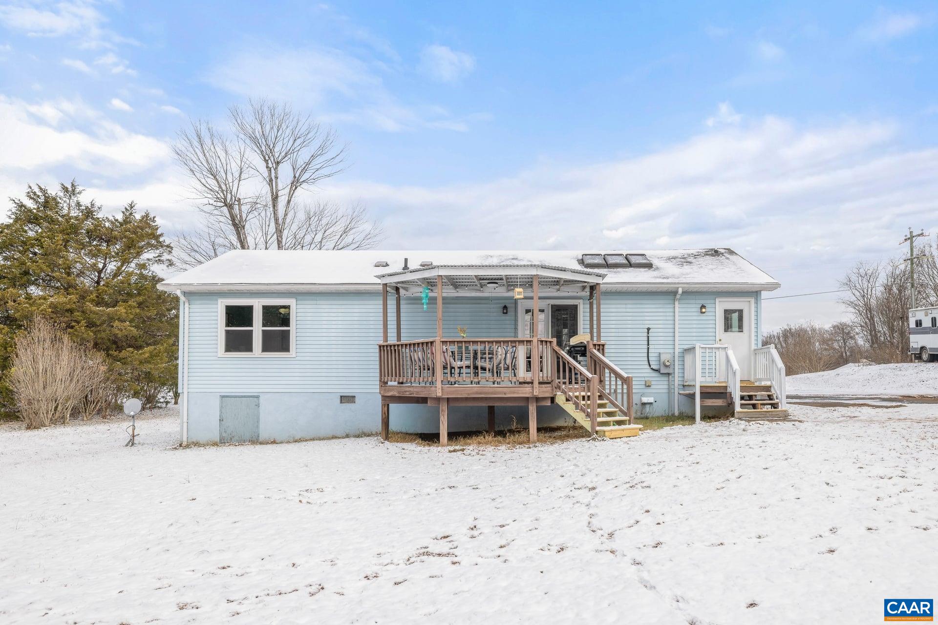 979 Cedar Grove Road Ruckersville, VA 22968 - Photo 27 of 33 a view of a house with a yard and sitting area